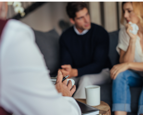 Couple getting marriage help in counseling.