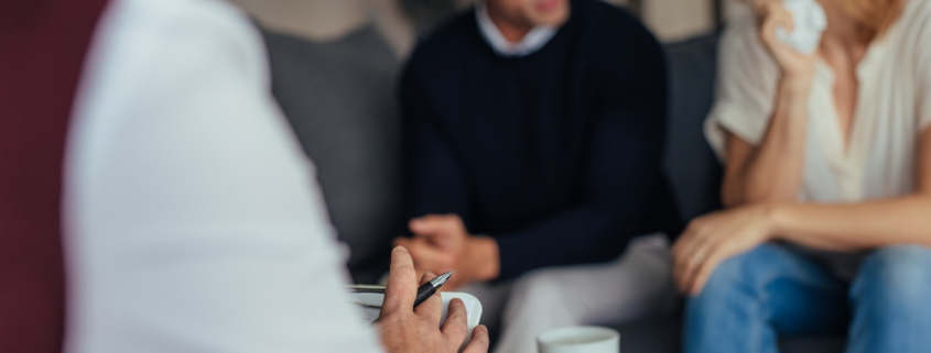 Couple getting marriage help in counseling.