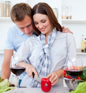 Intimate couple preparing dinner